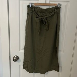 Press midi paper bag skirt.